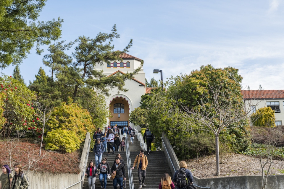 Students on the stairs of Founders Hall